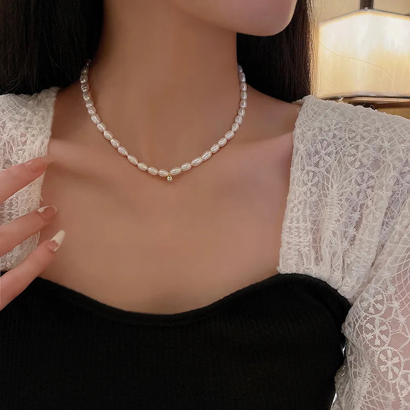 Pearl Bow Pendant Choker Necklace