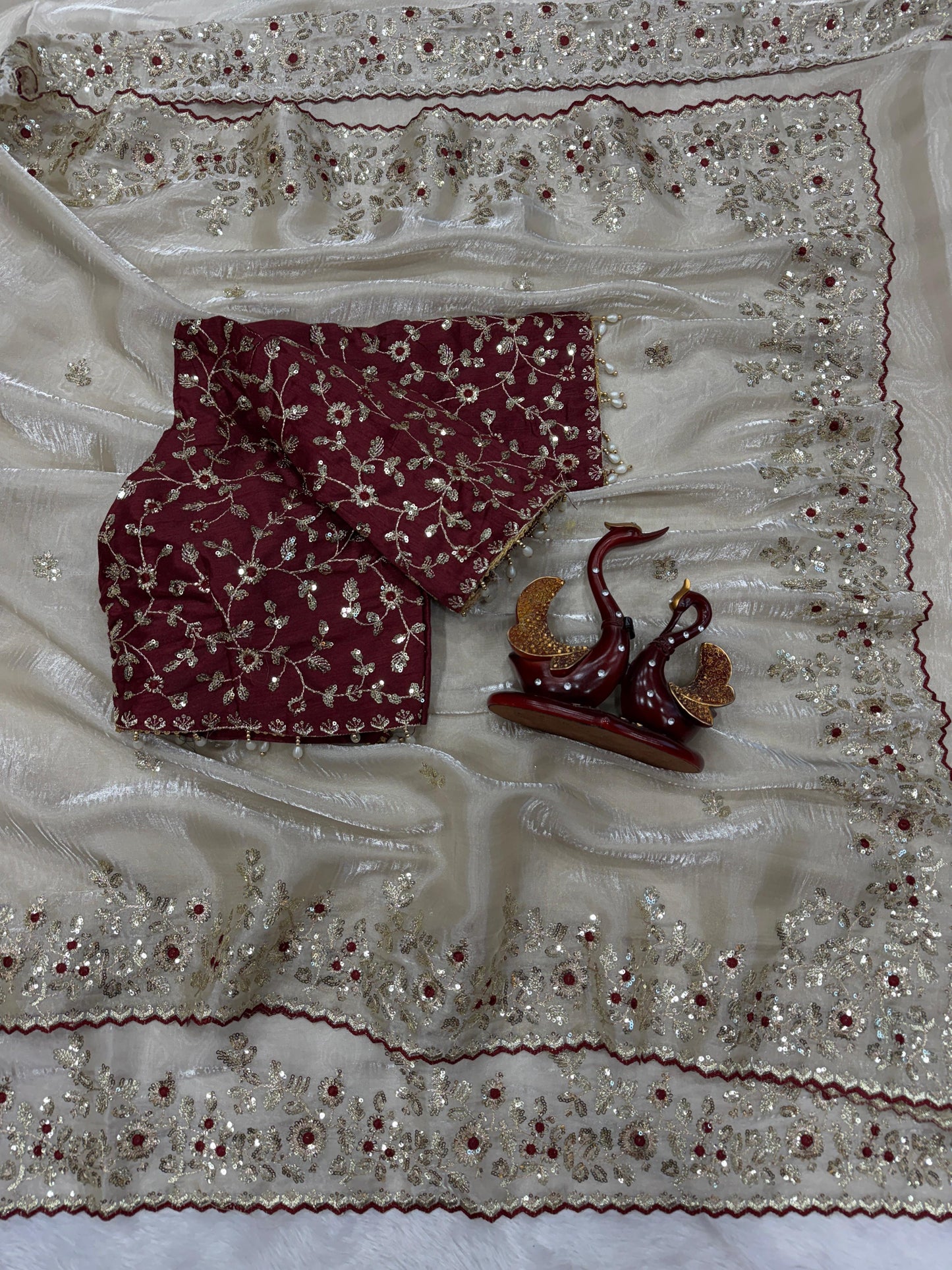 White soft jimmy choo silk saree with beautiful sequence embroidery work