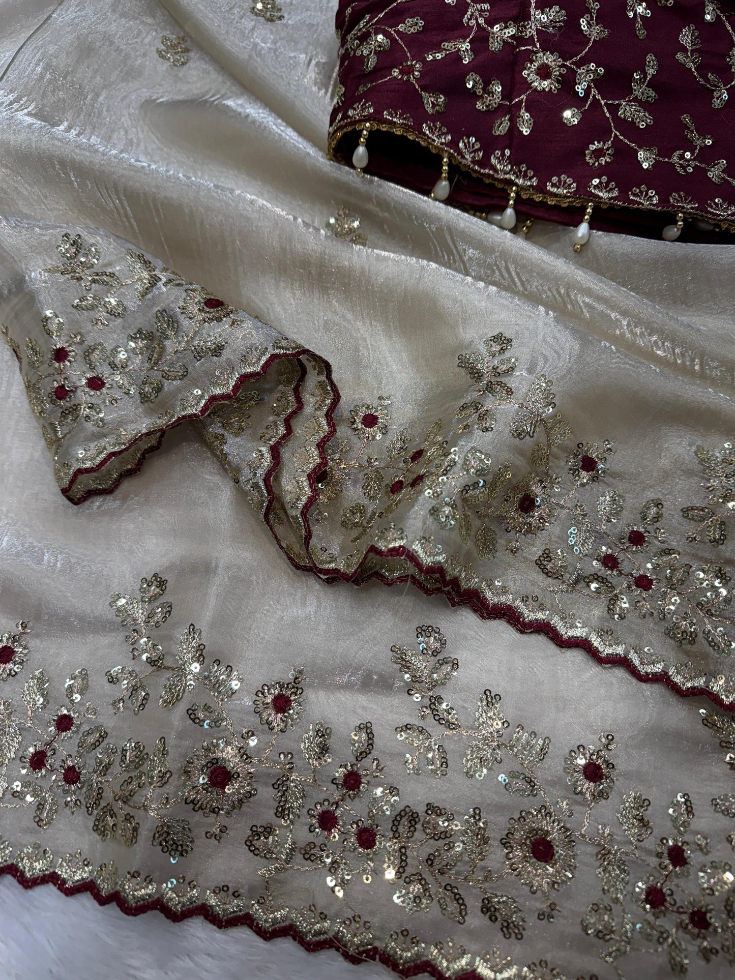 White soft jimmy choo silk saree with beautiful sequence embroidery work