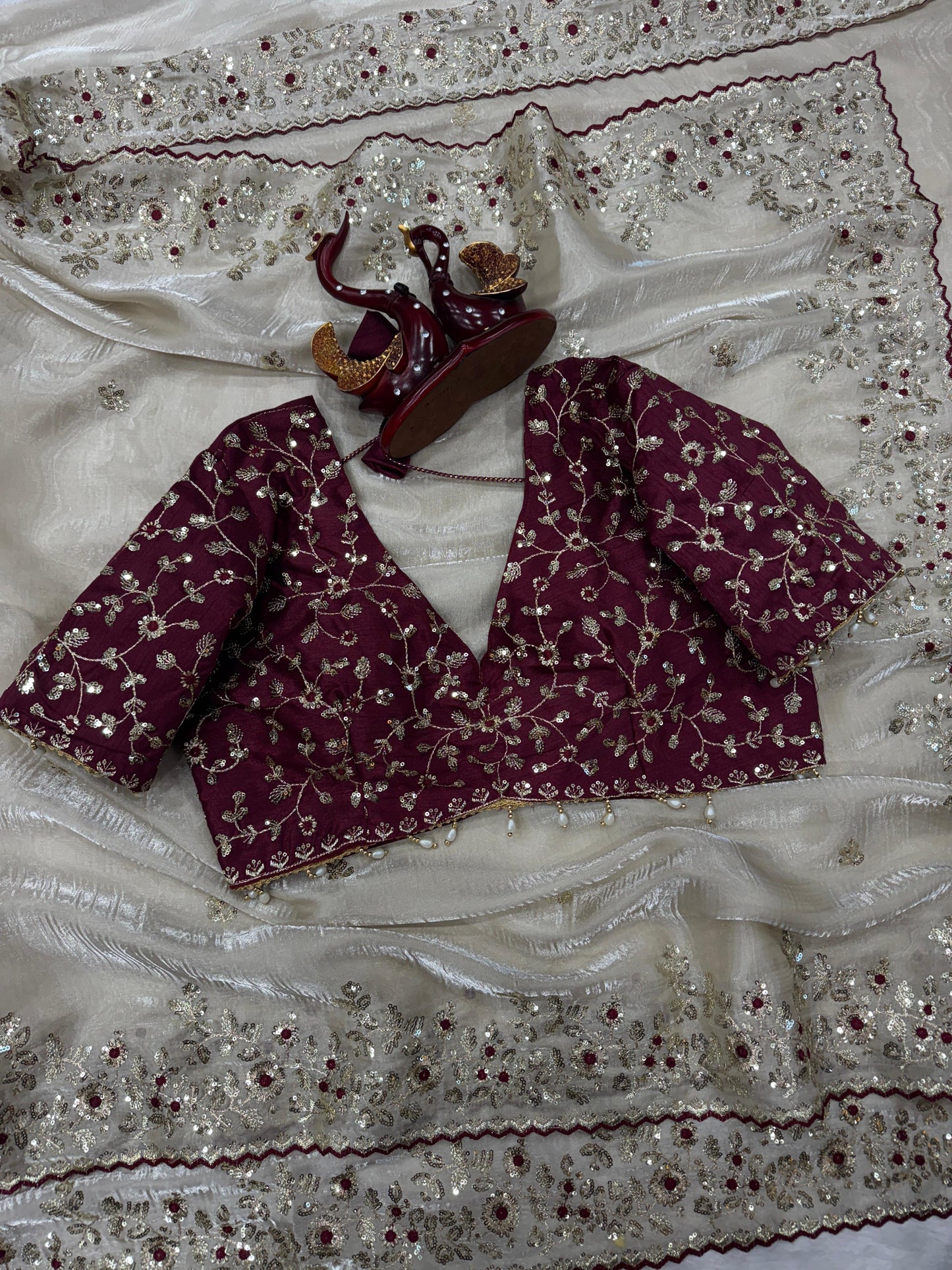 White soft jimmy choo silk saree with beautiful sequence embroidery work